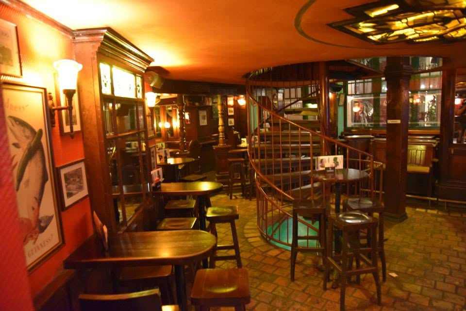 Spiral staircase and seating inside Dublin Inn Hannover