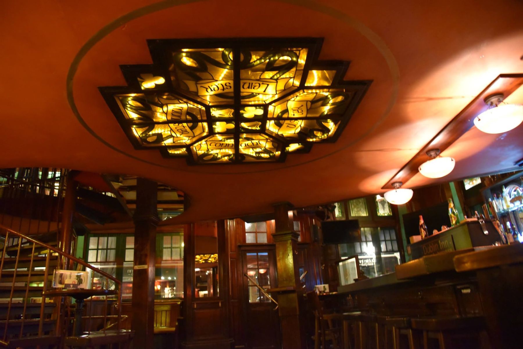 Inside Dublin Inn Hannover — warm light and dark wood